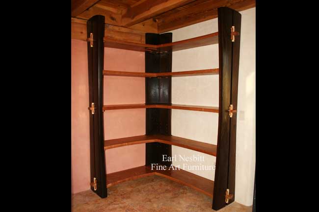 custom made corner bookshelf with solid wenge legs and cherry shelves